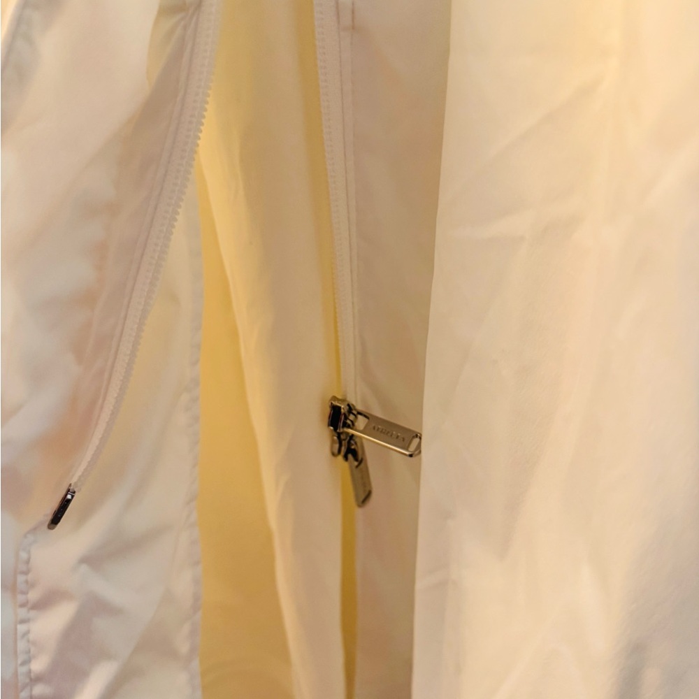 ATHLETA long, lightweight, white hooded windbreaker rain jacket. Elastic waist. - Picture 7 of 10
